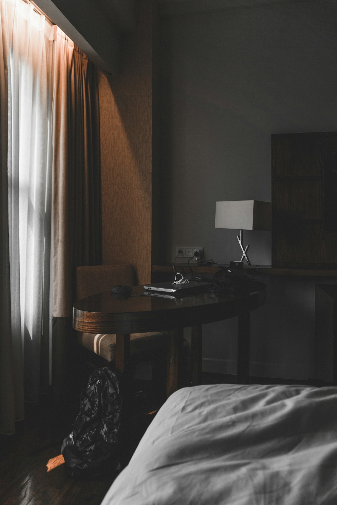 Moody dark hotel bedroom